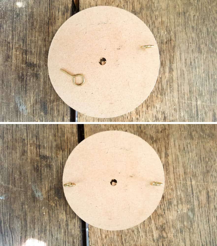 Screw the eye hooks into the wooden base