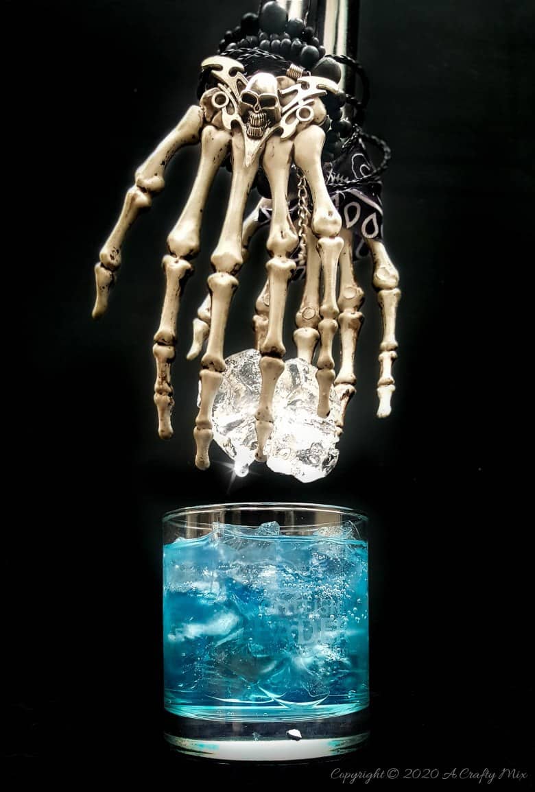 If you&rsquo;re looking for a humerus Halloween repurpose idea that&rsquo;s functional and guaranteed to make your guests smile, then you&rsquo;ll love these skeleton hand ice tongs. #HalloweenCraft #SkeletonIceTongs #ACraftyMix #DIYHalloween #SkeletonTongs