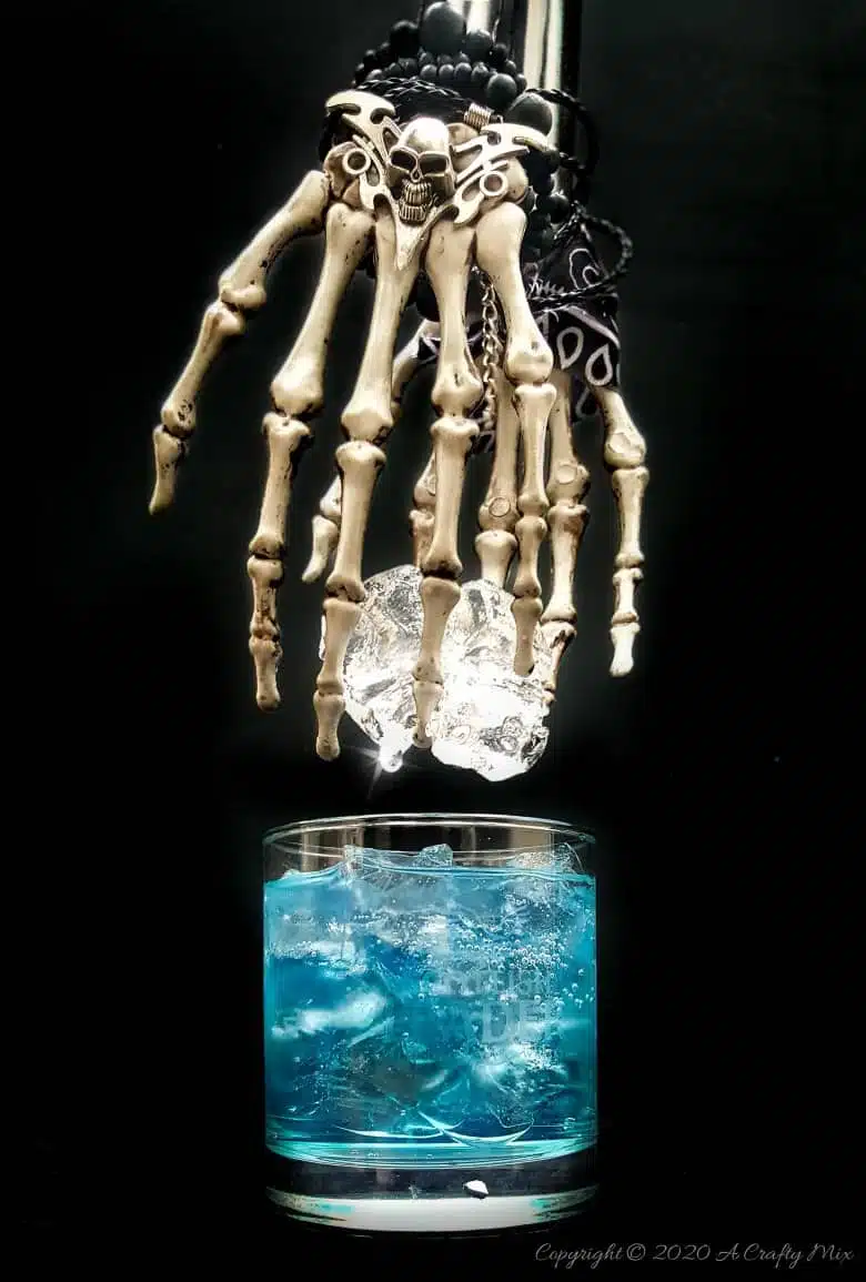 If you’re looking for a humerus Halloween repurpose idea that’s functional and guaranteed to make your guests smile, then you’ll love these skeleton hand ice tongs. #HalloweenCraft #SkeletonIceTongs #ACraftyMix #DIYHalloween #SkeletonTongs