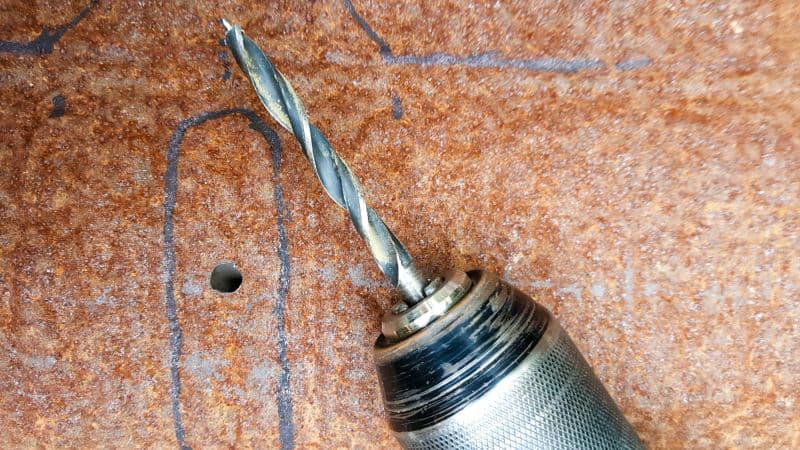 Drill a pilot hole for the jigsaw