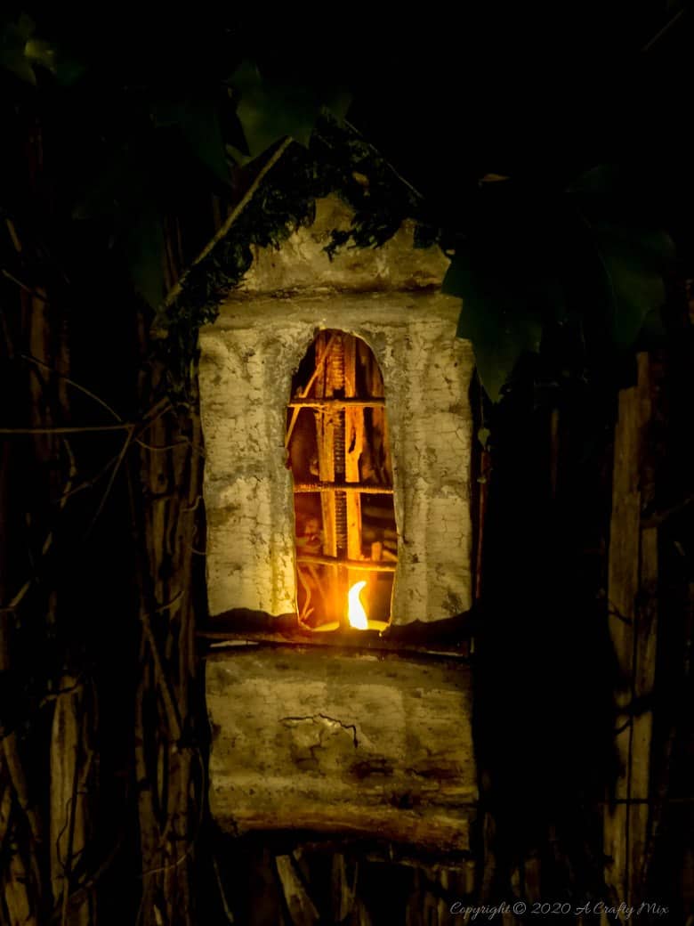 This easy to follow tutorial will show you to repurpose rusty scrap metal bits into a fairy bay window with lights. #FairyWindow #fairyCrafts #ACraftyMix #ScrapMetalRepurpose #TinCeilingTiles