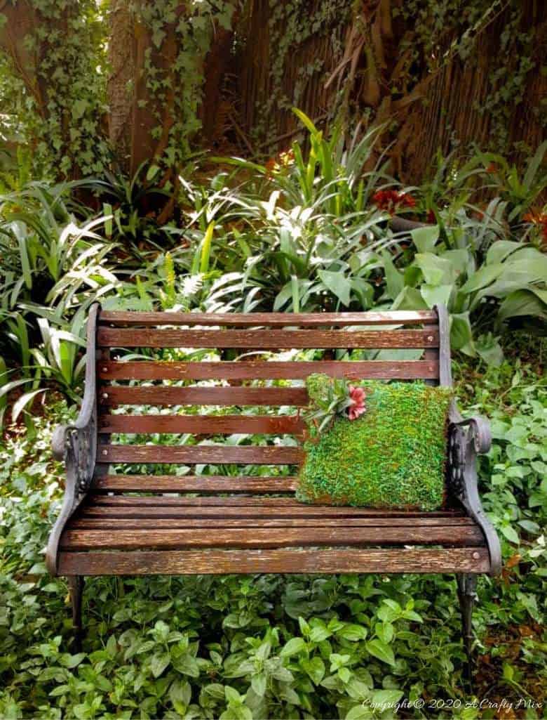 Take your garden decor to a whole new level with this beautiful moss pillow succulent planter. Not only is it easy to make but it also adds a magical touch to any outdoor space #gardendecor #mosspillow #acraftymix #succulentplanter #gardendecorideas