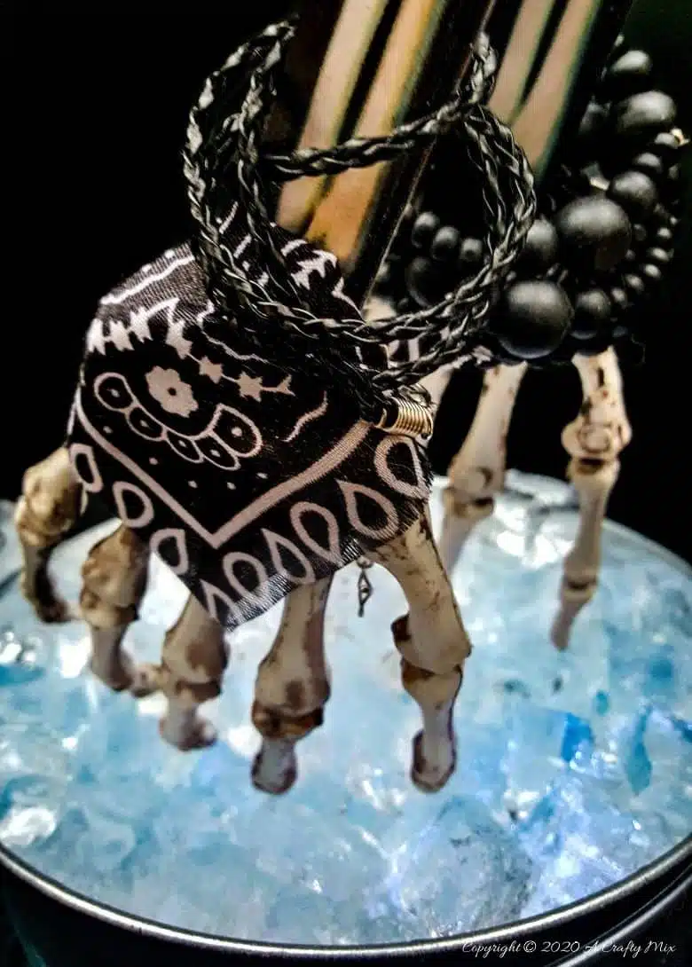 If you’re looking for a humerus Halloween repurpose idea that’s functional and guaranteed to make your guests smile, then you’ll love these skeleton hand ice tongs. #HalloweenCraft #SkeletonIceTongs #ACraftyMix #DIYHalloween #SkeletonTongs