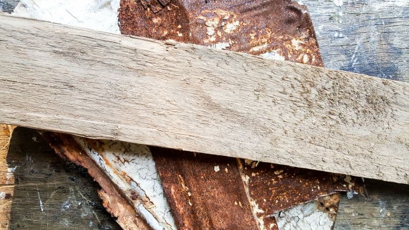 To make the fairy bay window we used leftover scraps of tin ceiling tile and wood off cuts