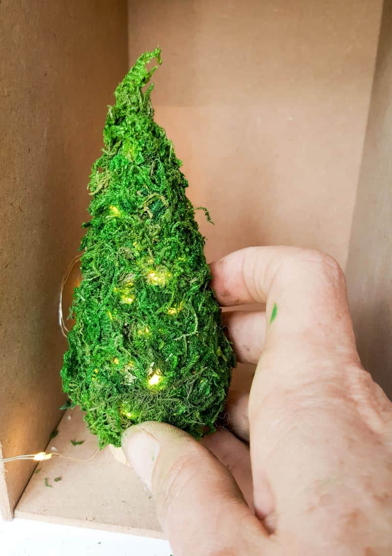 Make sure the Christmas tree fits before moving to the next step