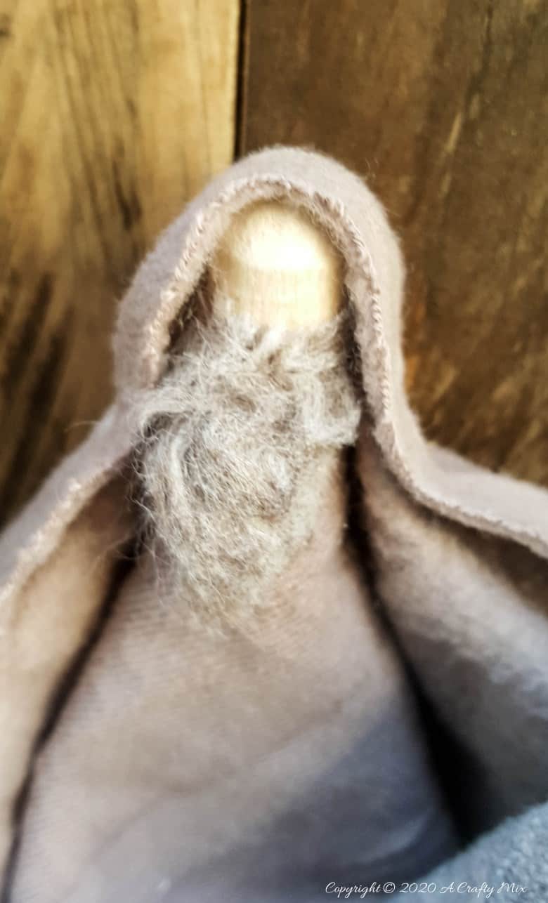This easy to follow tutorial will show you how to make a rustic clothespin Nativity scene out of fabric scraps and wooden pegs. The tutorial includes a &ldquo;free to download&rdquo; printable for the angel wings and detailed instructions to make Mary, Joseph, the Angel and baby Jesus #ClothesPinCrafts #DIYNativity #WoodenPegCrafts #ACraftyMix #ChristmasCrafts #NativityScene