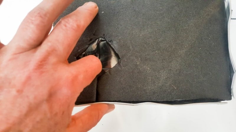 Make a hole that large enough to fit the roots of the succulent through