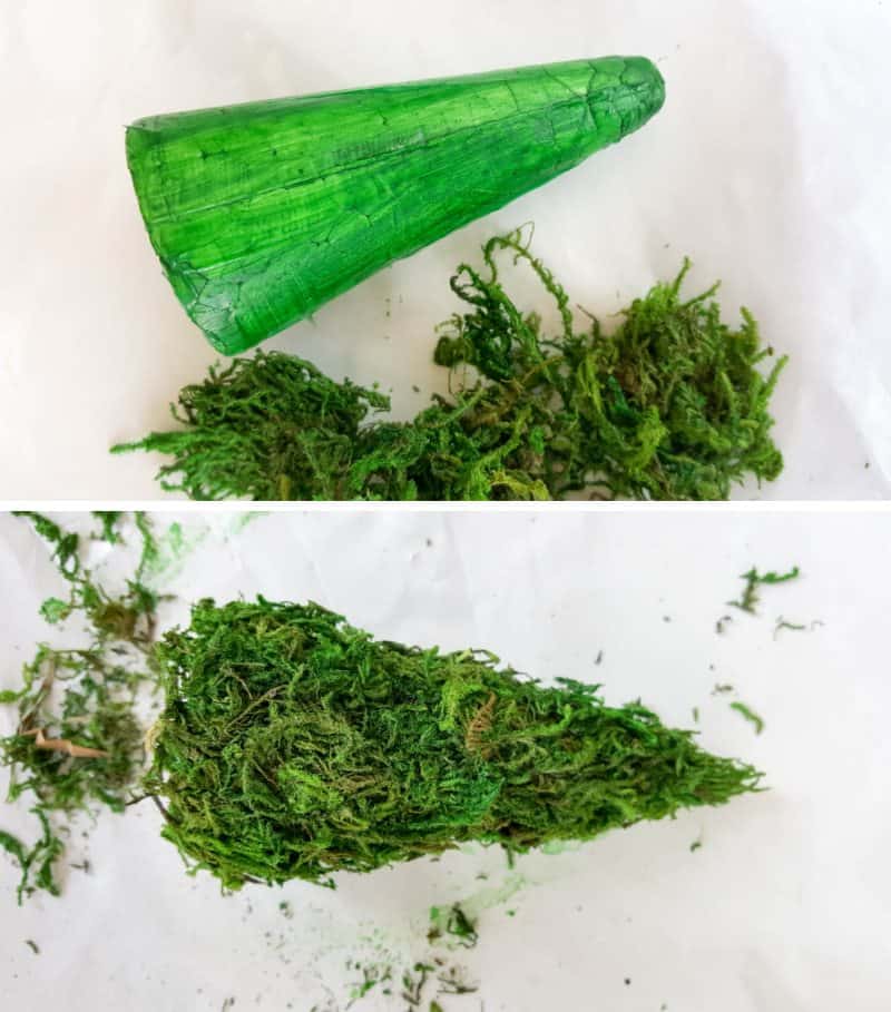 Cut the top of a polystyrene cone off and paint green. Glue on some craft moss