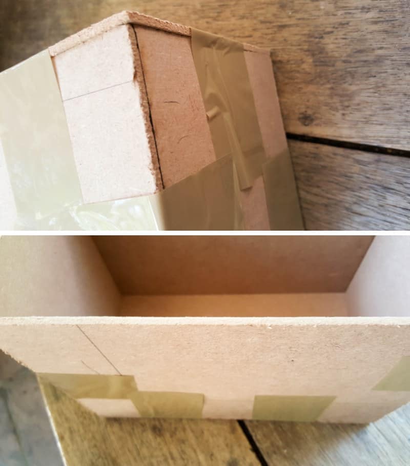 Use duct tape to tape the sides and top of the book nook together