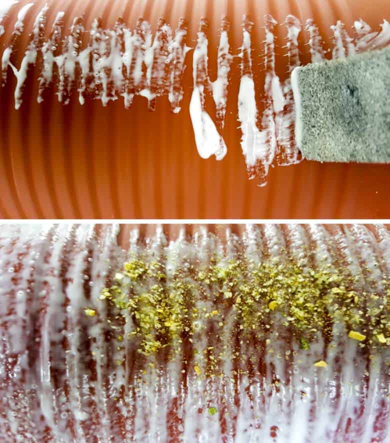 Brush on liberal amounts of outdoor mod podge or glue before adding the coarse spice