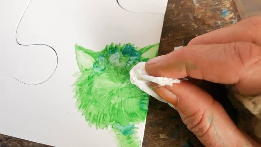 Use a kitchen towel to blend the paint.