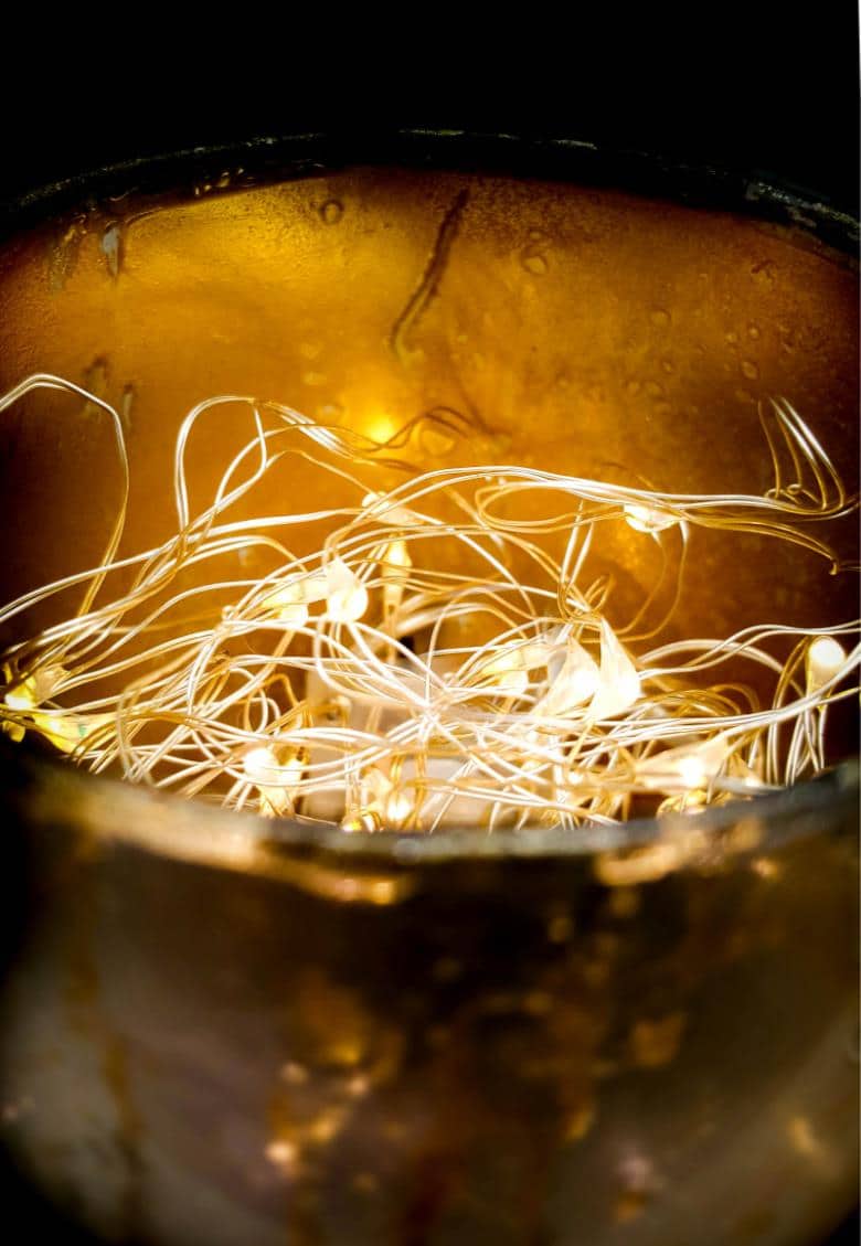 Don&rsquo;t throw those broken wine glasses away until you&rsquo;ve seen how you can repurpose them to make these gorgeous chalice or goblet lights. The step-by-step tutorial includes a video that will show you how to cut the wine glass and how to get that mercury glass effect in two easy steps. #Wineglassrepurpose #BrokenGlass #ACraftyMix #DIYGoblet #Chalice #MercuryGlass