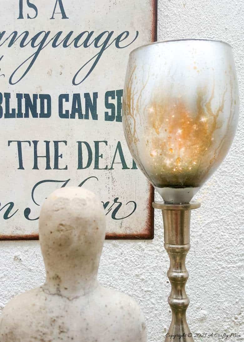 Don&rsquo;t throw those broken wine glasses away until you&rsquo;ve seen how you can repurpose them to make these gorgeous chalice or goblet lights. The step-by-step tutorial includes a video that will show you how to cut the wine glass and how to get that mercury glass effect in two easy steps. #Wineglassrepurpose #BrokenGlass #ACraftyMix #DIYGoblet #Chalice #MercuryGlass