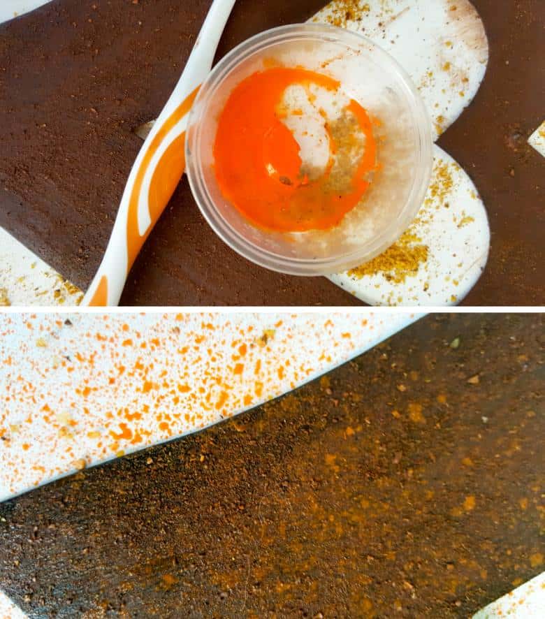 Using an old toothbrush splatter some orange on the cardboard heart