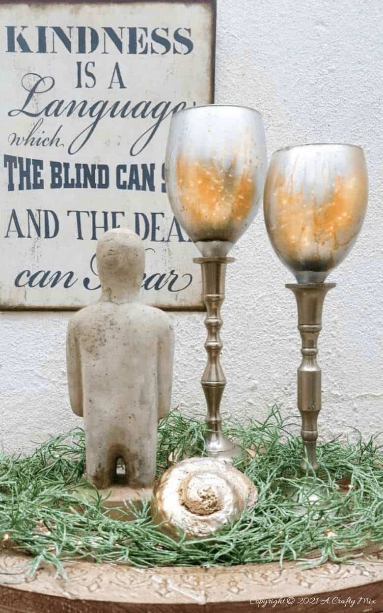 Don’t throw those broken wine glasses away you’ve seen how you can repurpose them to make these gorgeous chalice or goblet lights. The step-by-step tutorial includes a video that will show you how to cut the wine glass and how to get that mercury glass effect in two easy steps. #Wineglassrepurpose #BrokenGlass #ACraftyMix #DIYGoblet #Chalice #MercuryGlass