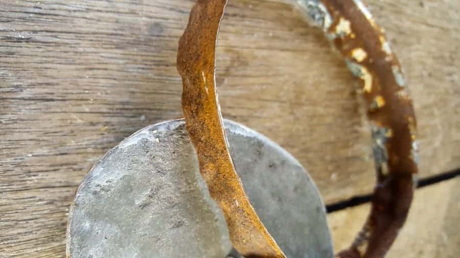 Trim the upper edge of the avocado boat with tin ceiling tile off cuts