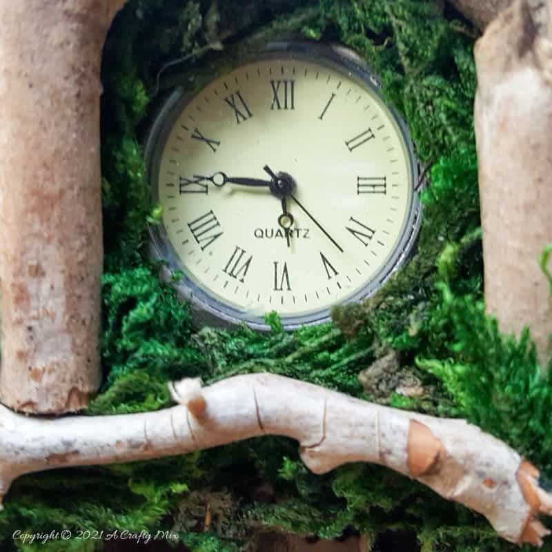 Have you ever wanted to make a real working fairy grandfather clock? This tutorial will show you how and includes a downloadable template along with instructions to make teeny, tiny mushrooms and a fairy bird&rsquo;s nest. #FairyCrafts #ACraftyMix #MiniatureGrandfatherClock
