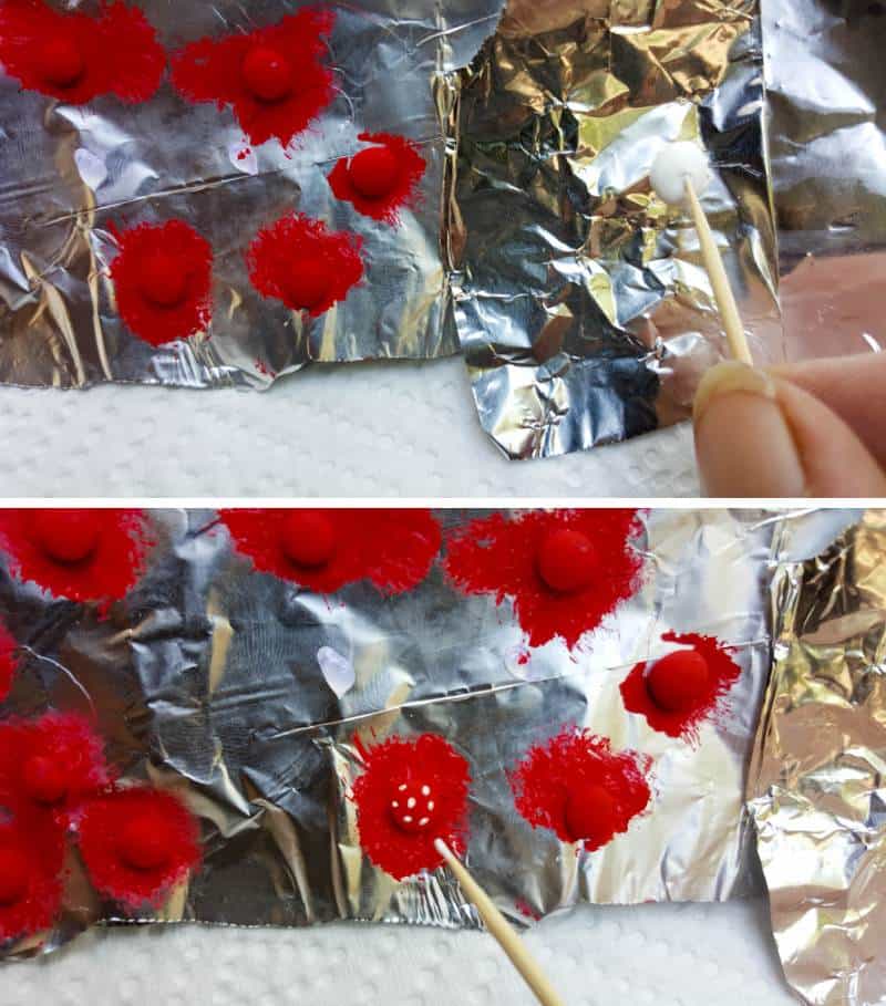 Use a toothpick to paint small dots on the mushroom tops