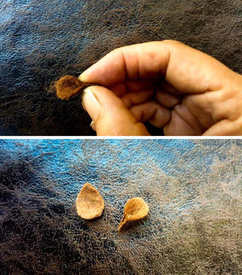 Add a drop of glue to the bottom of the ears and pinch together