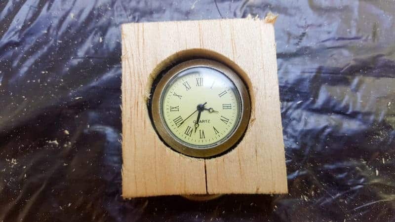 Cut the balsa wood to fit the clock face