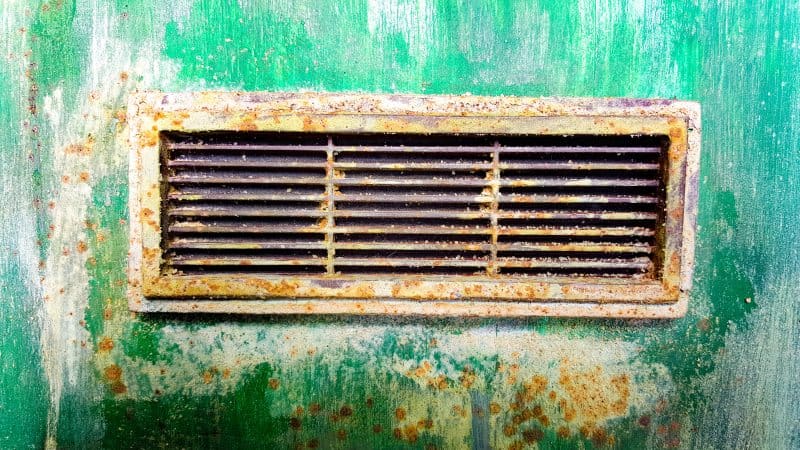 Apply the rust paint to the plastic vents