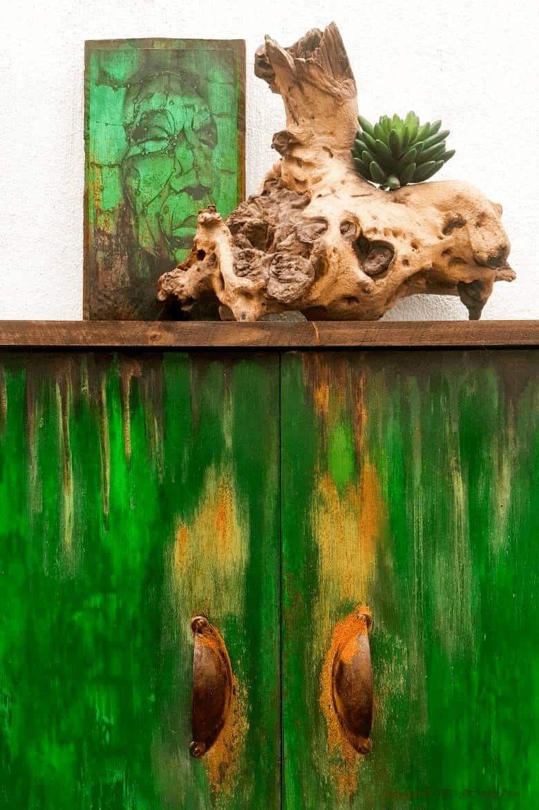 Ever found a cheap melamine cupboard at the thrift store that was just to &ldquo;bleh&rdquo; to fit into your d&eacute;cor style? This tutorial will show you how to give it an easy faux distressed metal makeover that won&rsquo;t break the bank. #melaminmakeover #paintingmelamine #acraftymix #fauxmetal #UnicornSpit