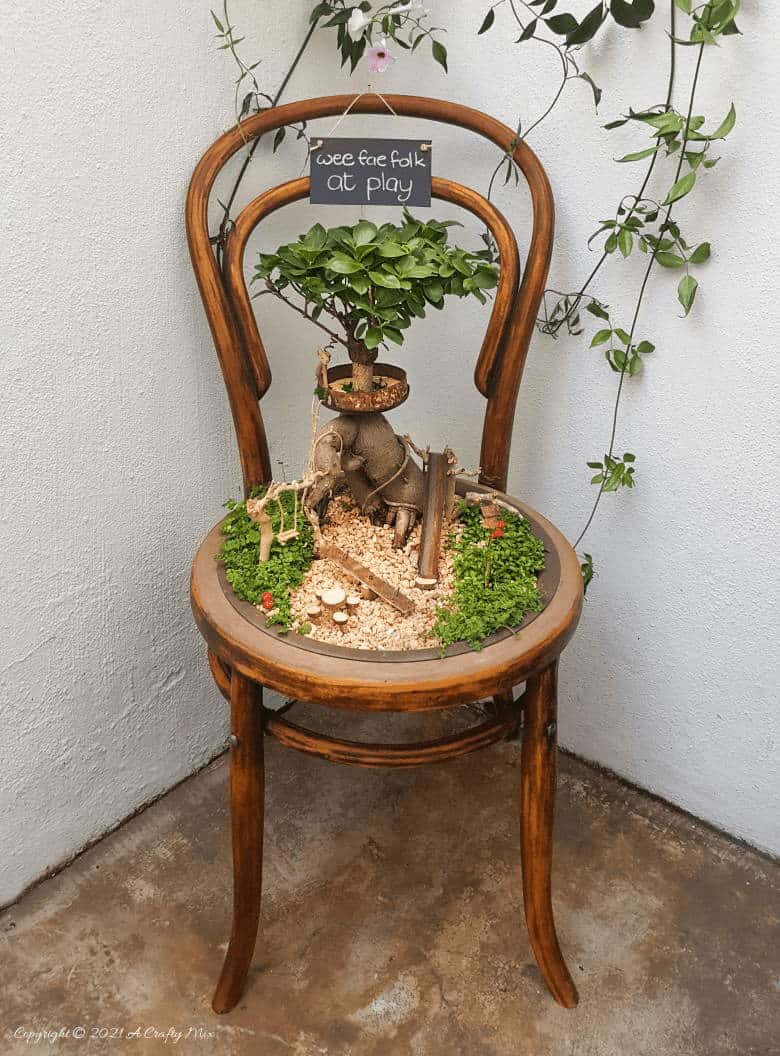 This photo-rich tutorial will show you how you can make your own fairy playground using what you have in your craft cupboard. No fancy tools needed and everything can be made in a morning #FairyGarden, #ACraftyMix, #Playground