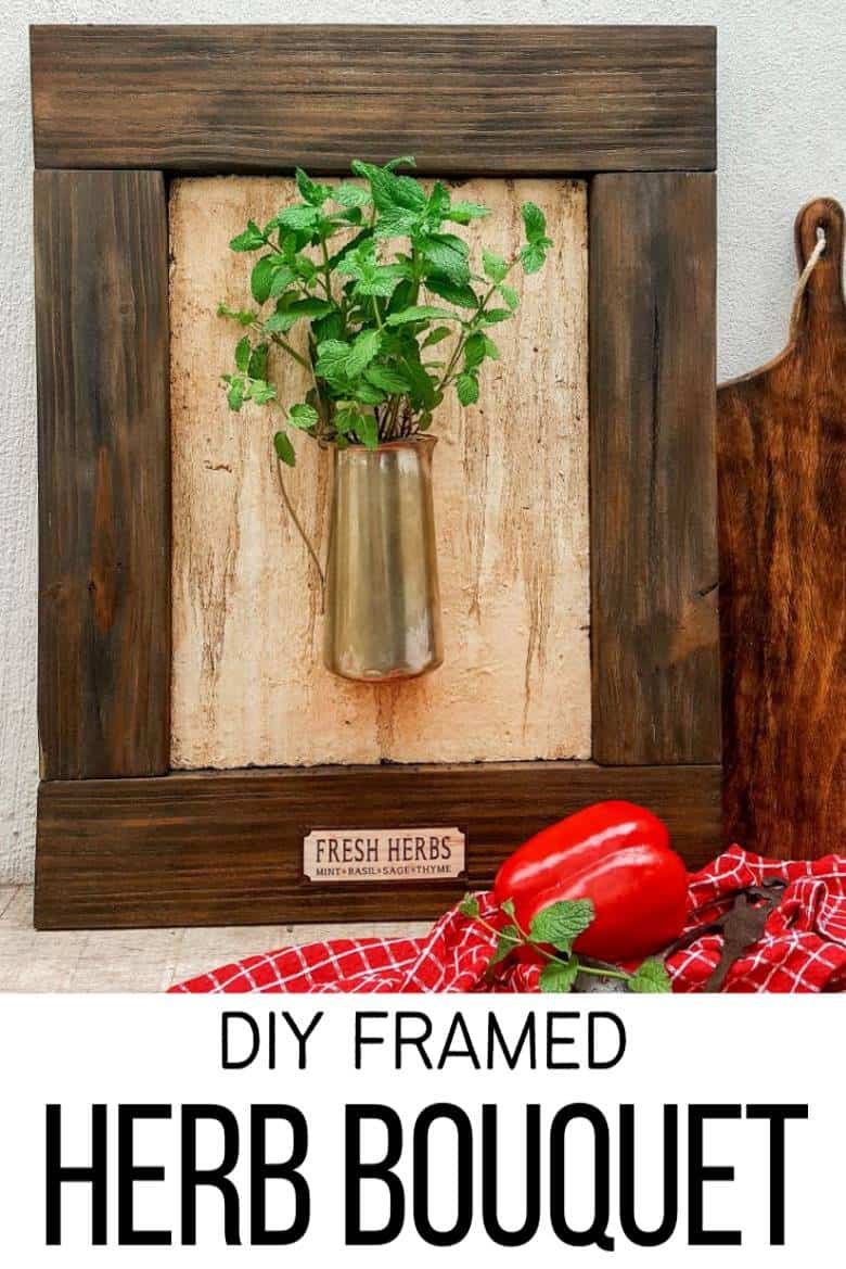 I love this fresh twist on the traditional herb garden. The framed bouquet of fresh herbs can be propped on the counter or hang it up if you prefer to keep your counters clutter free. #IndoorHerbs #IndoorGarden #FramedGarden #ACraftyMix #DistressedWall #DistressedFrame #GardenInspiration#FreshHerbs