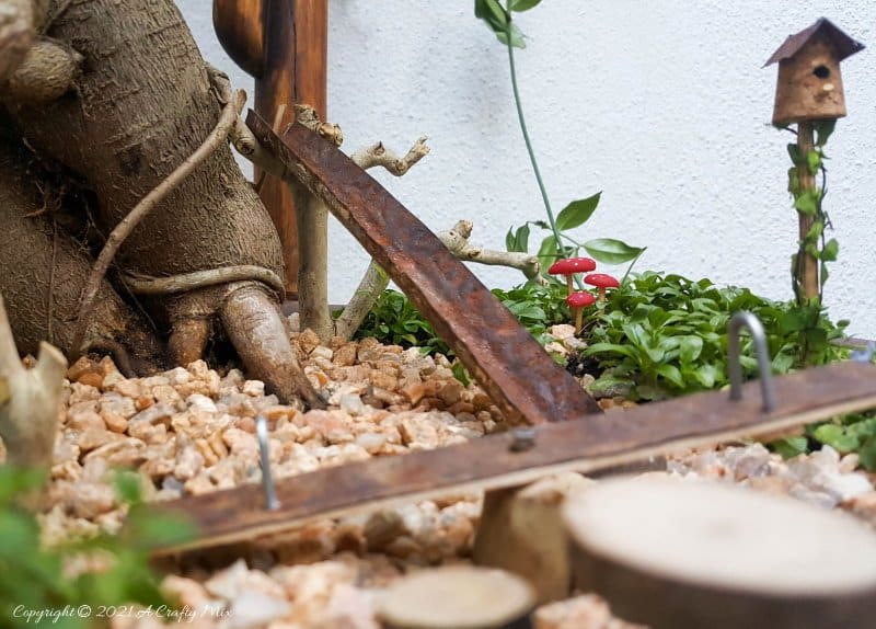 This photo-rich tutorial will show you how you can make your own fairy playground using what you have in your craft cupboard. No fancy tools needed and everything can be made in a morning #FairyGarden, #ACraftyMix, #Playground