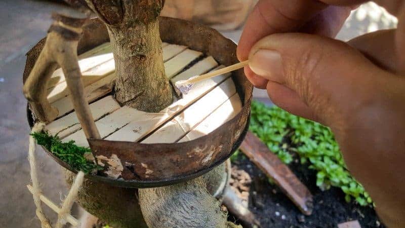 For hard to reach spots apply the glue with a toothpick