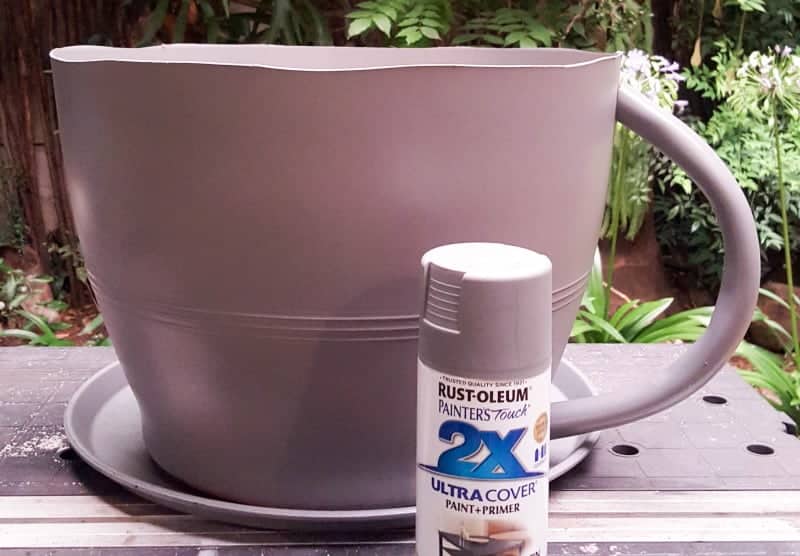 Paint the teacup and saucer with grey primer if you're going to give it a faux concrete look
