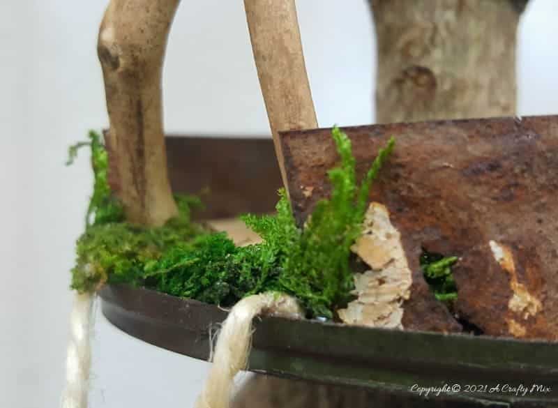 This photo-rich tutorial will show you how you can make your own fairy playground using what you have in your craft cupboard. No fancy tools needed and everything can be made in a morning #FairyGarden, #ACraftyMix, #Playground