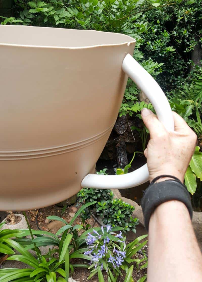 Make a statement in the garden with this DIY Oversized Teacup Planter. You can also use it as a prop at your next Alice in Wonderland tea party. #TeacupPlanter #GiantTeaCup #ACraftyMix #DIYPlanter