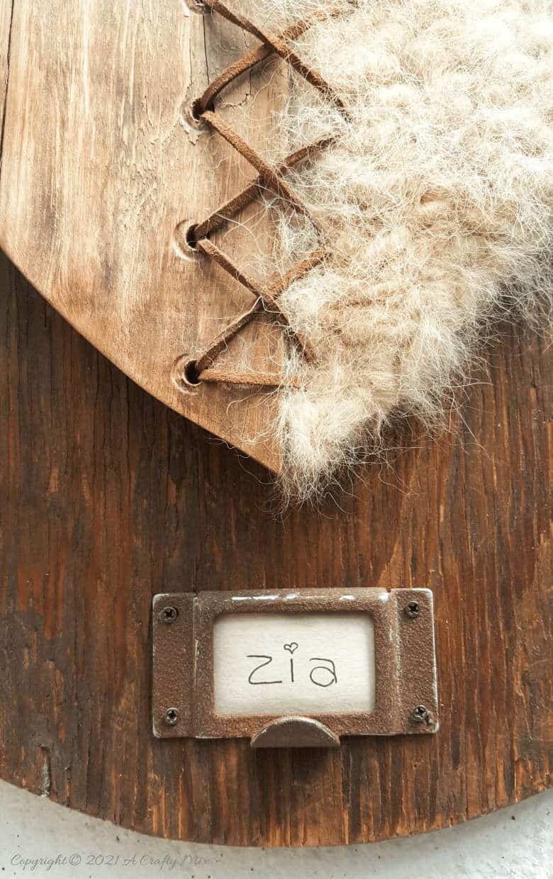 Our dogs shed a lot but instead of cursing them, I decided to make a spun pet hair heart using all the fur that our babies discard so lovingly all over our home. This tutorial will show you how you can turn your fur baby's shed hair into a precious keepsake and includes a video tutorial that will show you how to comb and spin pet hair. #PetCrafts #ACraftyMix #PetKeepsake