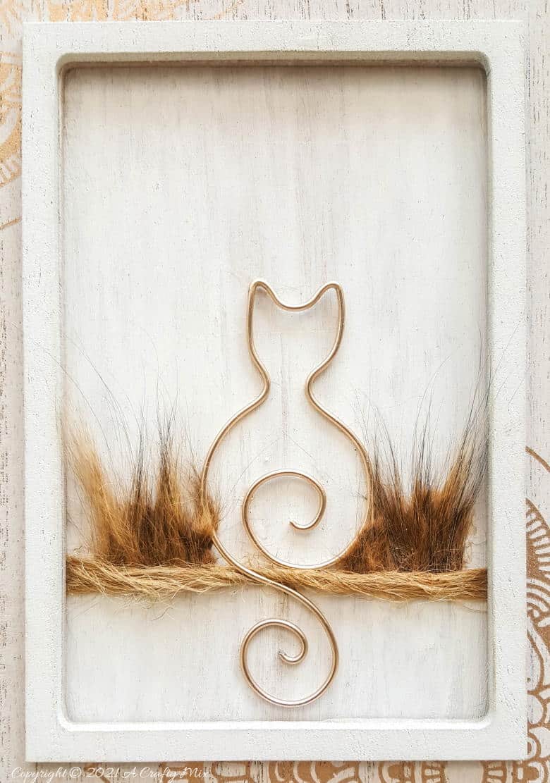 If you're looking for a way to remember a special cat that's crossed over the rainbow bridge, this tutorial will show you how to make a wire kitty art memorial. The tutorial includes a free template to work from #WireArt #ACraftyMix #MemoryArt