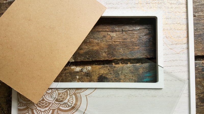 Remove the backing from the frame and put to one side