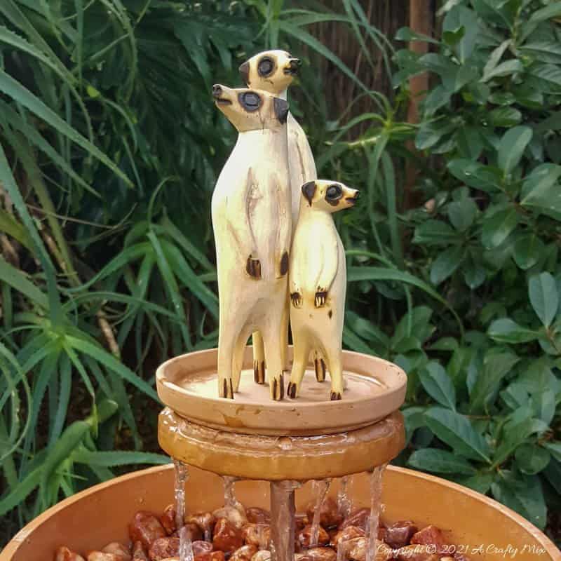 This photo-rich tutorial will show you how just how easy it is to repurpose an empty CD case and turn it in a CD spindle water feature bringing a calming, zen-like decorative feel to any space. #Spindlerepurpose #ACraftyMix #waterfeature