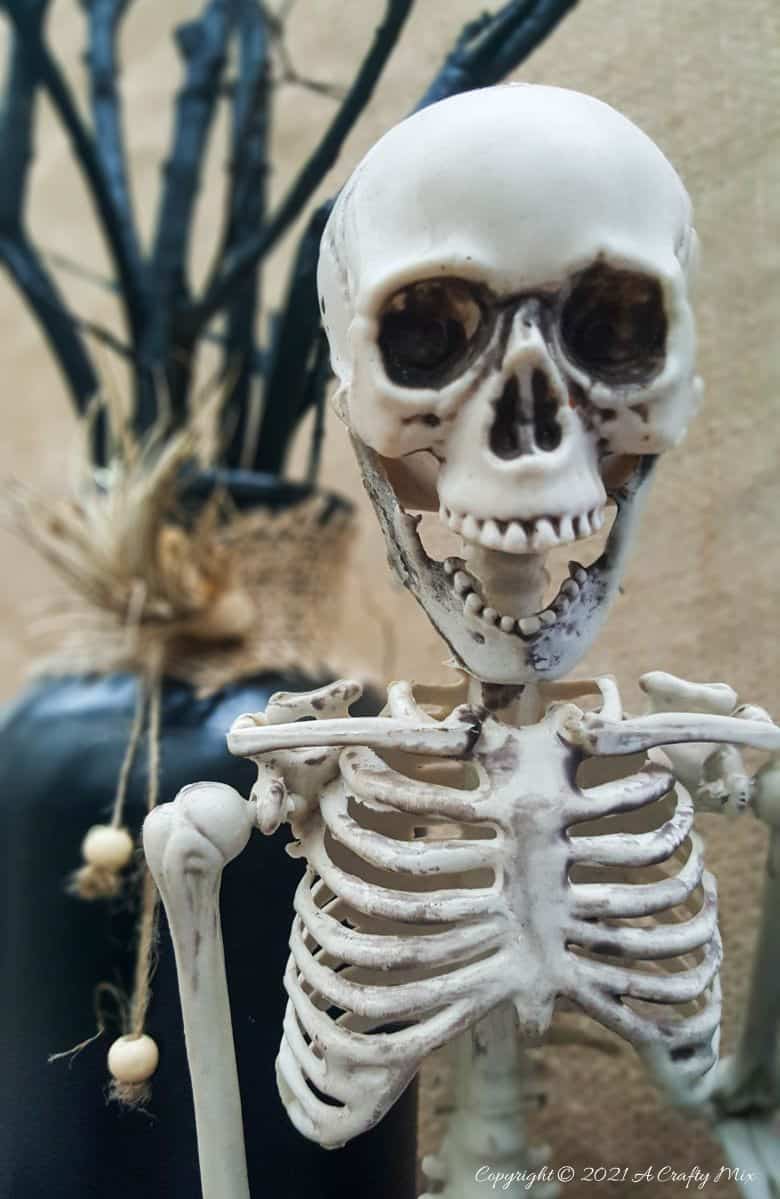Add a little fun and mystery to your Halloween decor with this easy-to-make magical floating tin can filled with ghost breath. You don't need any special tools and it takes less than an hour to make too. #HalloweenDecor #HalloweenCrafts #ACraftyMix #FloatingTinCan