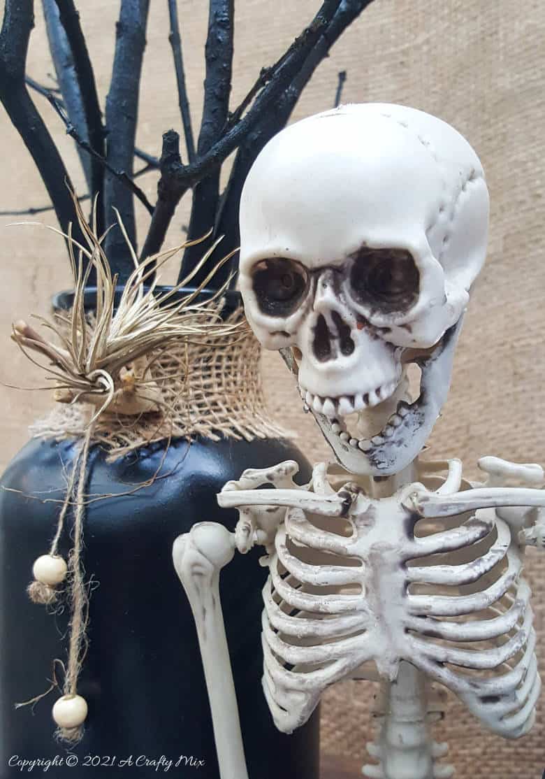 Add a little fun and mystery to your Halloween decor with this easy-to-make magical floating tin can filled with ghost breath. You don't need any special tools and it takes less than an hour to make too. #HalloweenDecor #HalloweenCrafts #ACraftyMix #FloatingTinCan