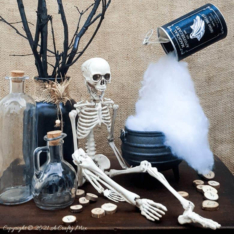 Add a little fun and mystery to your Halloween decor with this easy-to-make magical floating tin can filled with ghost breath. You don't need any special tools and it takes less than an hour to make too. #HalloweenDecor #HalloweenCrafts #ACraftyMix #FloatingTinCan