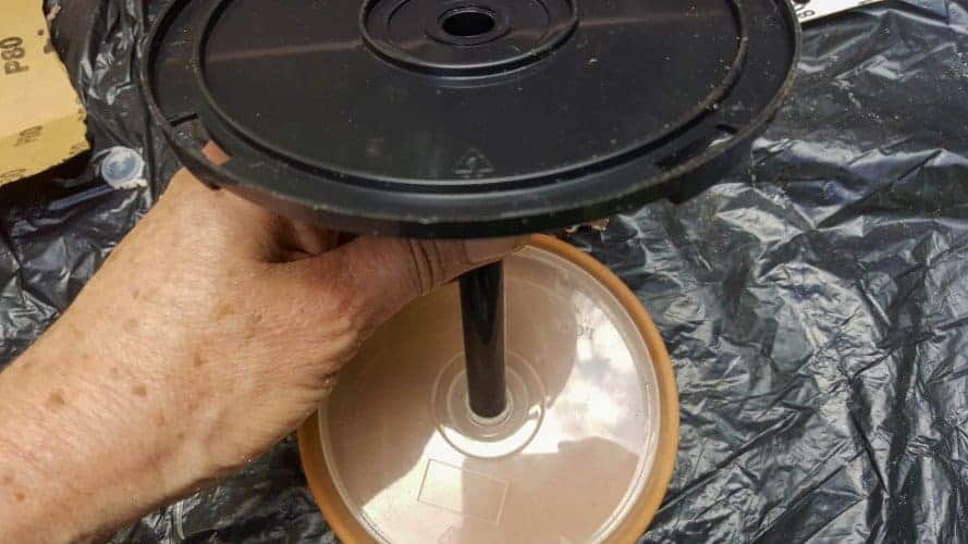 A mockup of how the empty CD case pieces fit together to make the water feature