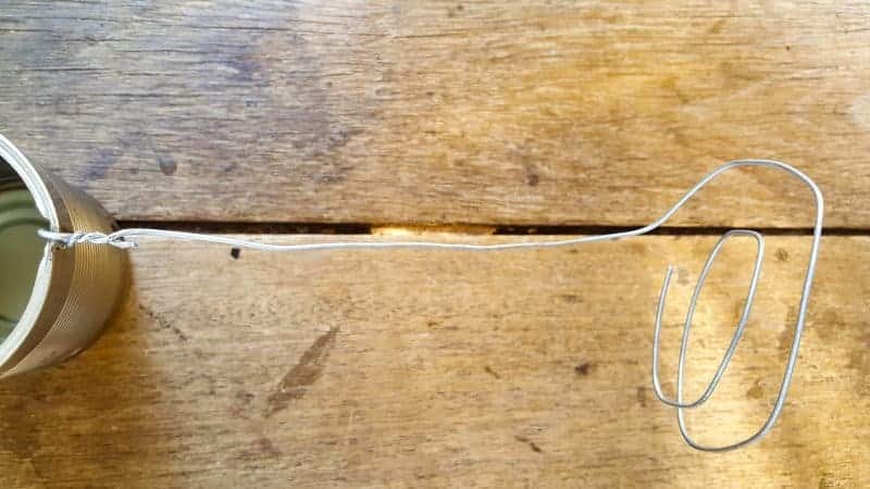Bend the bottom end of the wire into a twirled shape