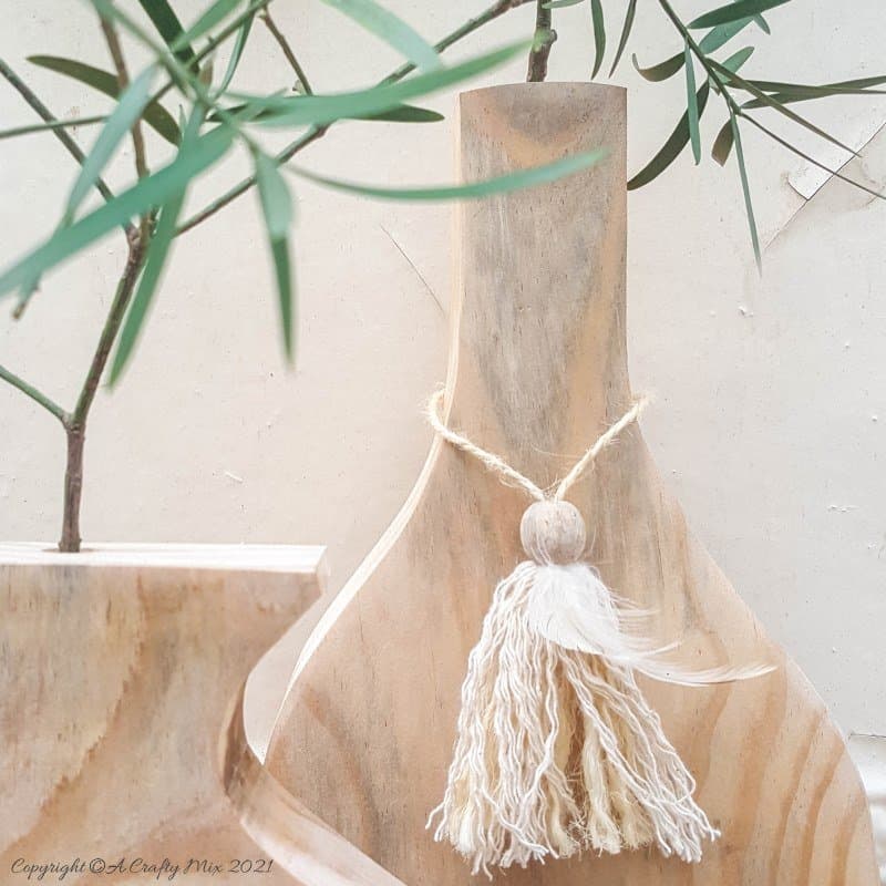 Dolly up your wooden vase with a beaded tassel