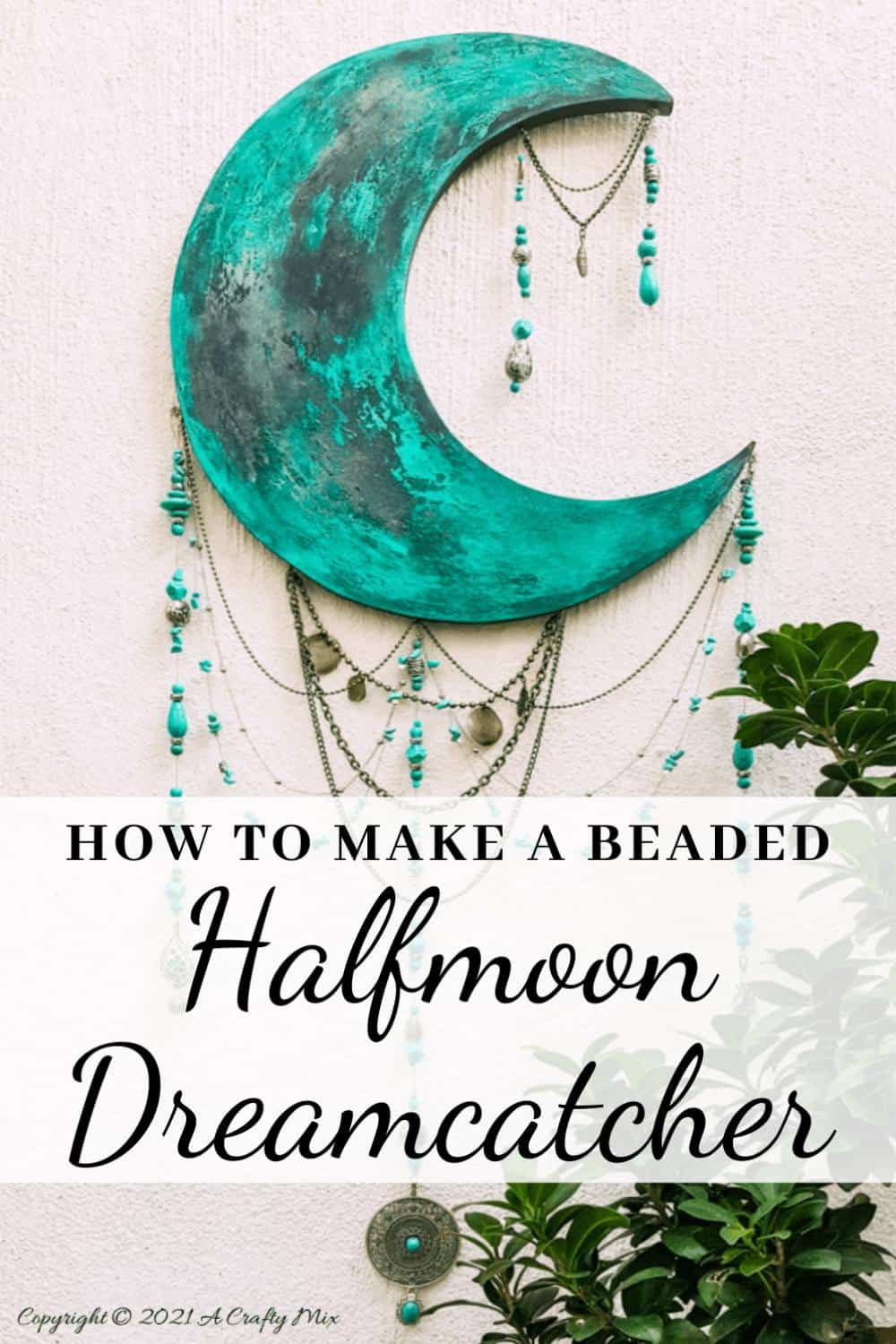 Vertical pin showing a large turquoise half‑moon wall hanging with a mottled, patina‑style finish, decorated with layered chains and teal beaded strands that dangle below, with overlaid text that reads &lsquo;How to make a beaded halfmoon dreamcatcher&rsquo; on a white banner at the bottom.