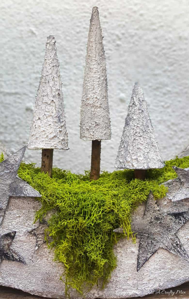 I&rsquo;m in love with how this DIY faux concrete light ring turned out. And no-one believes me when I tell them it's made entirely from a repurposed cardboard box. Easy budget-friendly decor that looks amazing. #cardboard #ACaftyMix #Homedecor