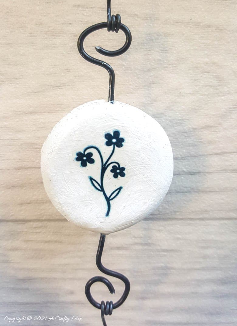 Easy budget friendly tattooed clay wall hanging that can be made in a morning. The photo rich tutorial includes free botanical printables to get you started. #WallDecor #ACraftyMix #AirDryClay
