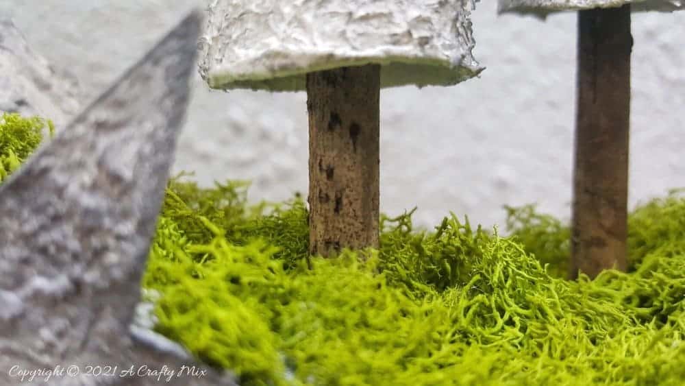 I&rsquo;m in love with how this DIY faux concrete light ring turned out. And no-one believes me when I tell them it's made almost entirely from a repurposed cardboard box. Easy budget-friendly decor that looks amazing. #cardboard #ACaftyMix #Homedecor