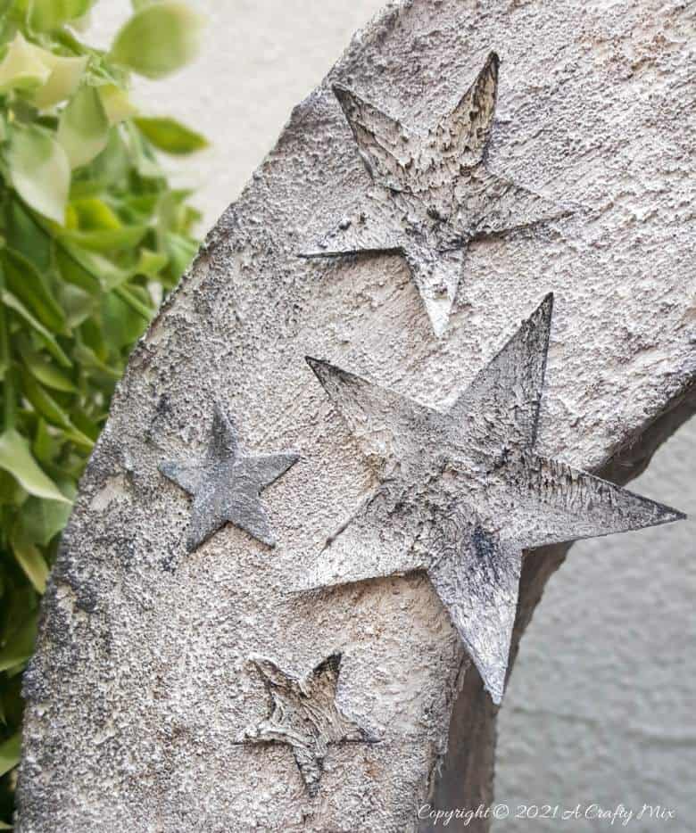 I&rsquo;m in love with how this DIY faux concrete light ring turned out. And no-one believes me when I tell them it's made entirely from a repurposed cardboard box. Easy budget-friendly decor that looks amazing. #cardboard #ACaftyMix #Homedecor