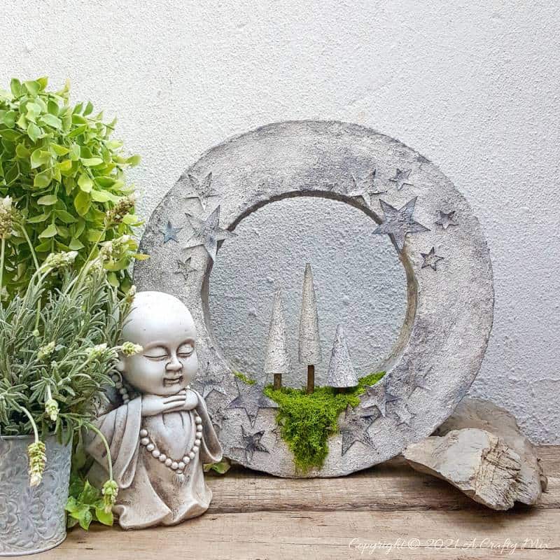 I&rsquo;m in love with how this DIY faux concrete light ring turned out. And no-one believes me when I tell them it's made almost entirely from a repurposed cardboard box. Easy budget-friendly decor that looks amazing. #cardboard #ACaftyMix #Homedecor