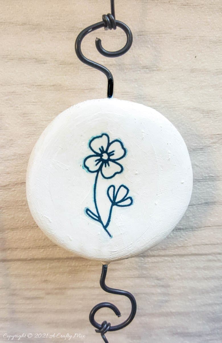 Easy budget friendly tattooed clay wall hanging that can be made in a morning. The photo rich tutorial includes free botanical printables to get you started. #WallDecor #ACraftyMix #AirDryClay